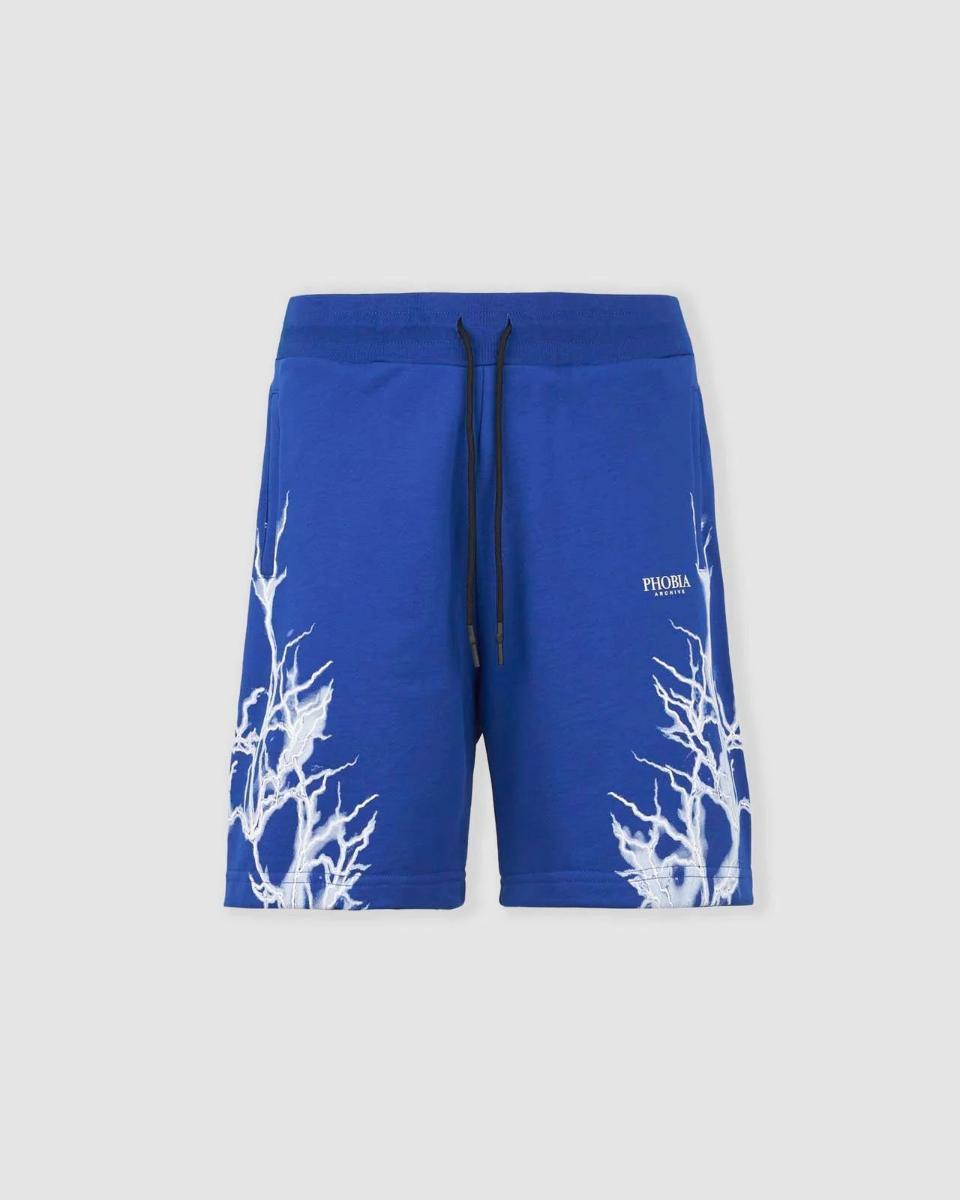 BLUE SHORTS WITH WHITE LIGHTNING PRINT AND LOGO PRINT